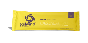 Yellow packet of tailwind lemon endurance fuel on a white background