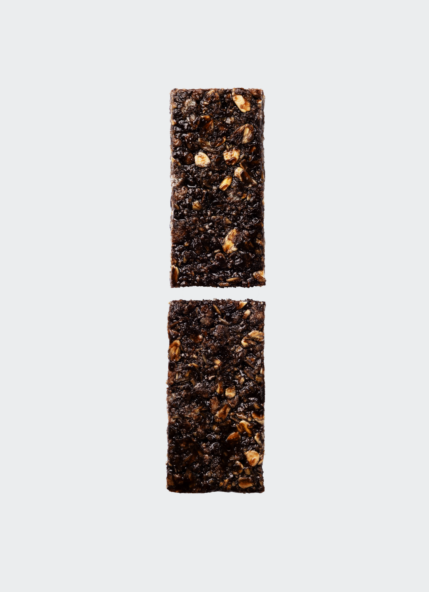 Maurten Solid C Bar in two halves without packaging on a white background