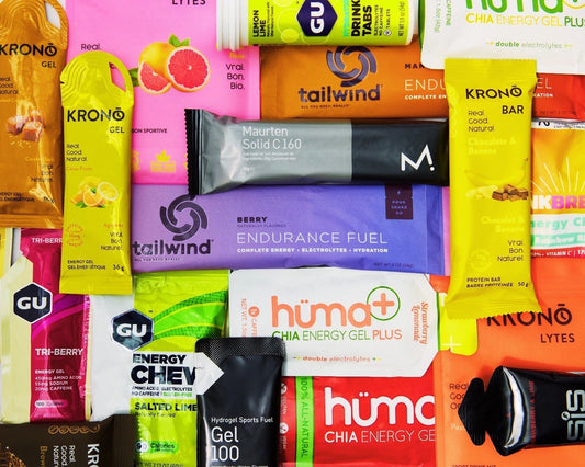 Colourful picture of various brands of sports gels and bars.