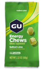 A packet of GU Energy Chews with watermelon flavor, featuring an image of sliced watermelon and the chews themselves visible through the clear window of the packaging.