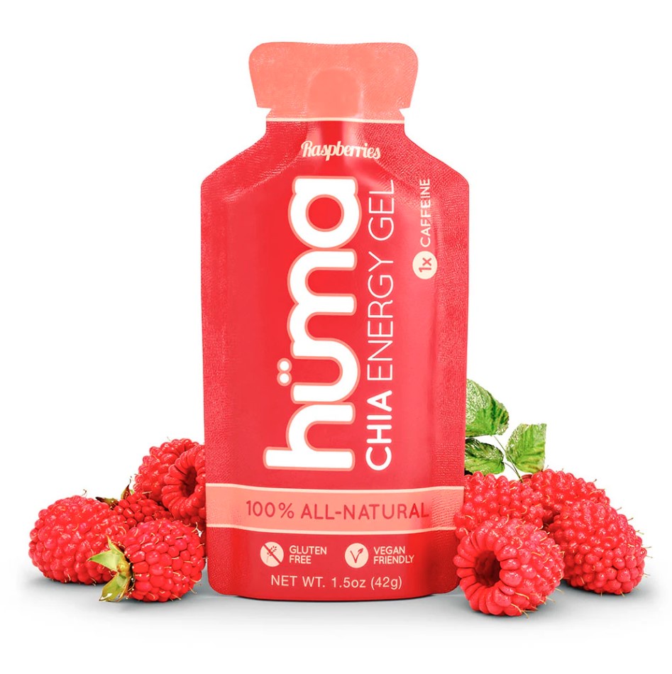 A packet of Huma Plus Gel energy gel in red color, with the text '100% All-Natural' and images of raspeberries on either side of the packet.