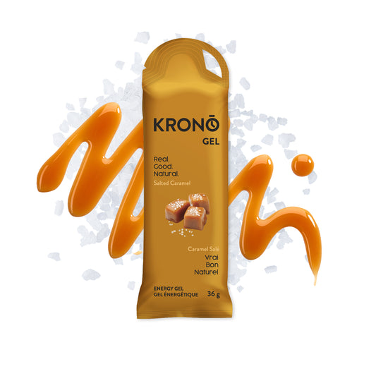 A packet of Krono Nutrition energy gel with a2D design, salted caramel flavor, and a splash of caramel syrup and salt.