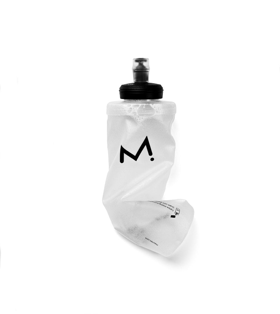Clear flexible Maurten DrinkFlask 550 ml water bottle with black cap on a white background