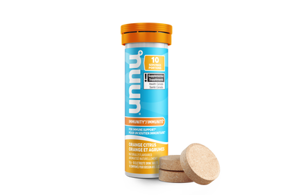 Nuun Immunity Supplement container with orange cap and blue label on a white background