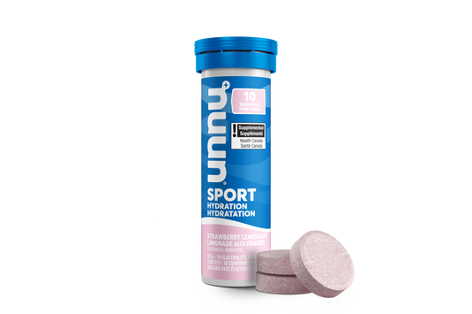 Strawberry Lemonade Nuun supplement container with pink tablets on a white background
