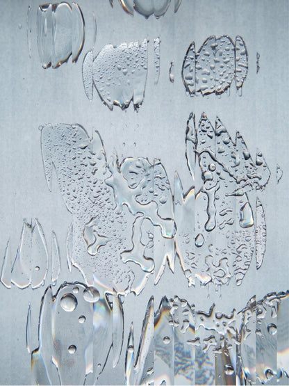 Distorted picture of water on glass showing Neutral flavour for Olway Electrolyte Mix | Fuel Kit