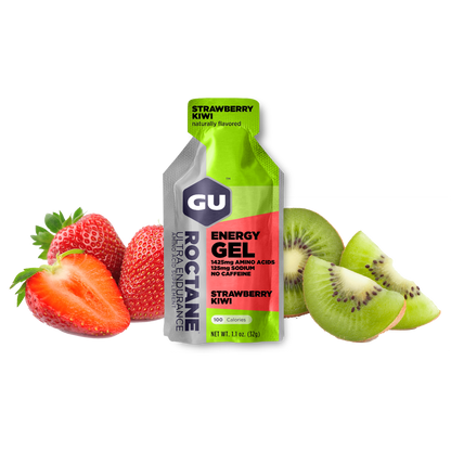 A packet of GU Roctane Energy Gel with Strawberry Kiwi flavor, accompanied by strawberries and kiwis on a white background.