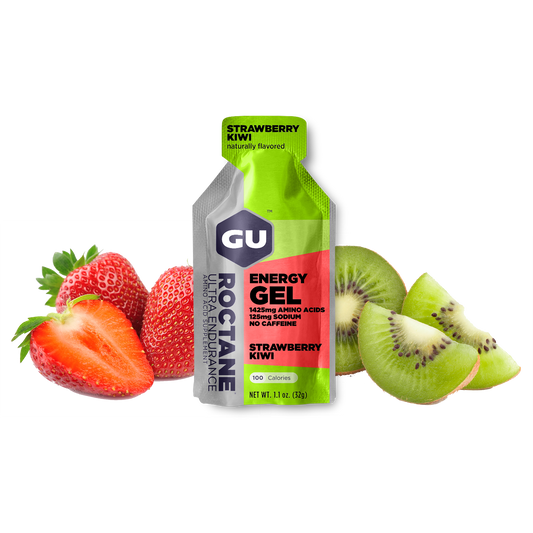 A packet of GU Roctane Energy Gel with Strawberry Kiwi flavor, accompanied by strawberries and kiwis on a white background.