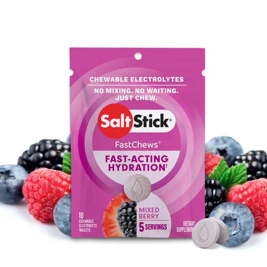 A packet of SaltStick FastChews with mixed berry flavor, featuring the product's name and benefits, surrounded by images of various berries.