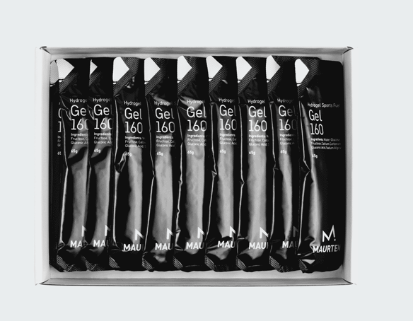 A pack of 10 black and silver packets of Maurten Gel 160, caffeine-free energy gel.