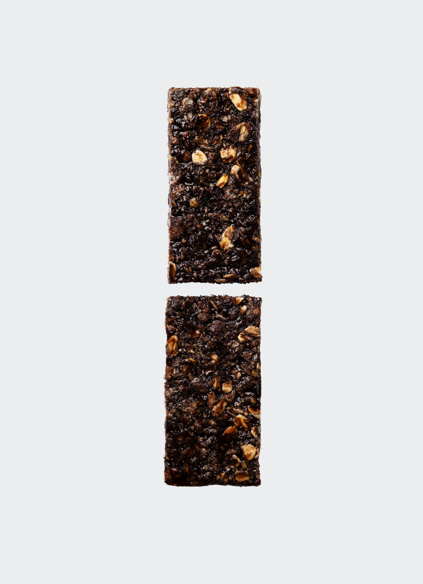 Maurten Solid C Bar in two halves without packaging on a white background
