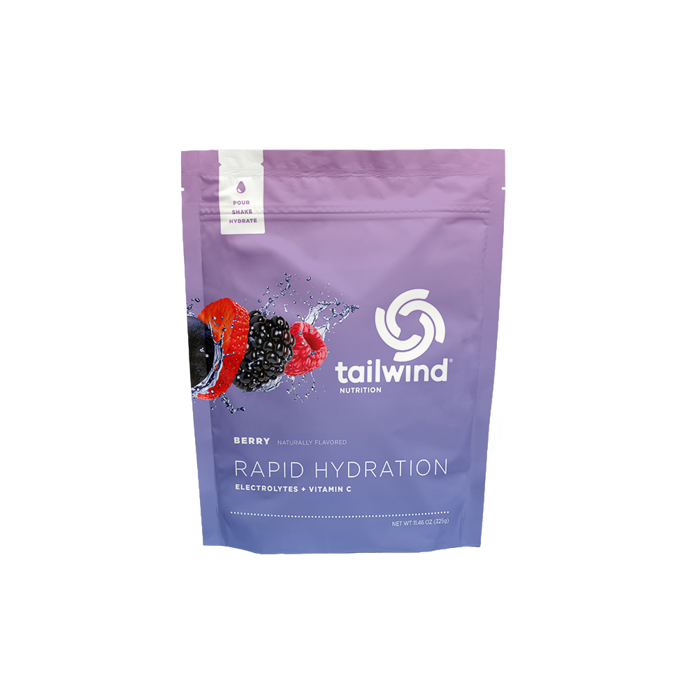 A pouch of Tailwind Rapid Hydration powder with berry flavor, designed for rapid hydration with electrolytes and Vitamin C.
