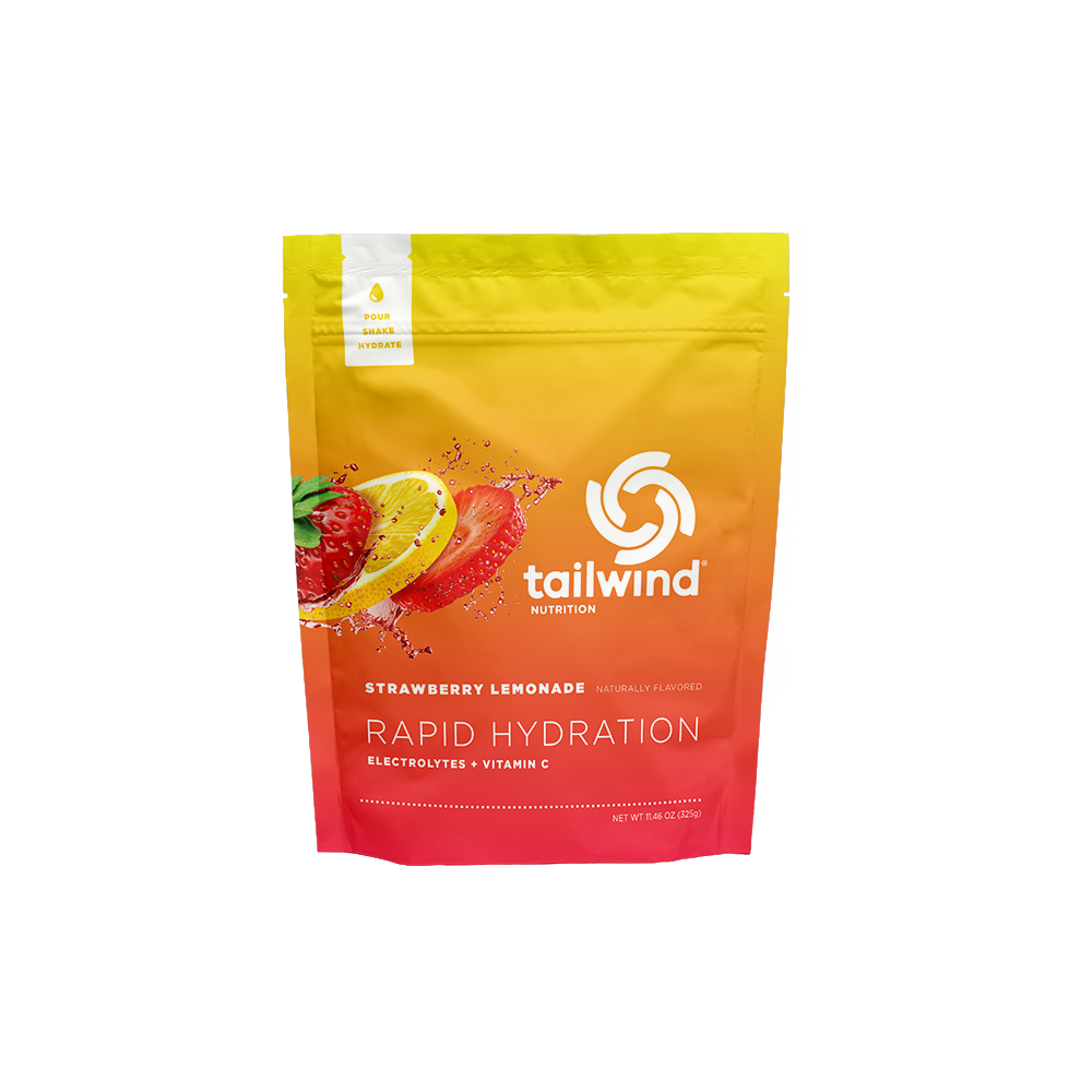 A pouch of Tailwind Rapid Hydration powder with strawberry lemonade flavor, designed for rapid hydration with electrolytes and Vitamin C.