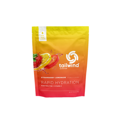 A pouch of Tailwind Rapid Hydration powder with strawberry lemonade flavor, designed for rapid hydration with electrolytes and Vitamin C.