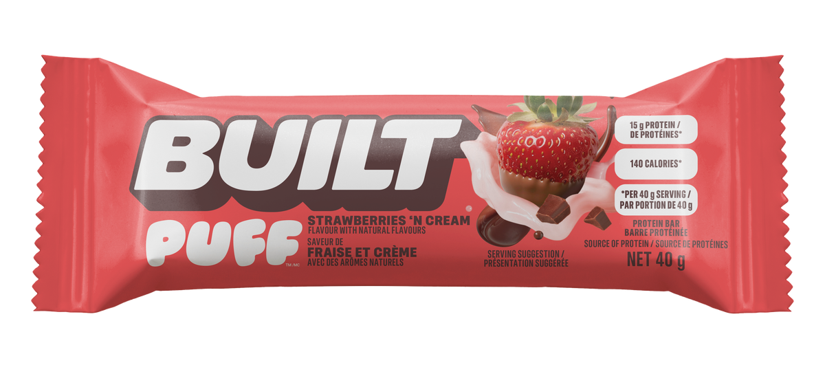 A single Built Puff protein bar wrapper in red, in the flavor 'Strawberries - N Cream', available at Fuel Kit